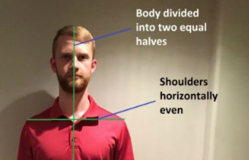 Kinesiologist demonstrates proper neck and chest position